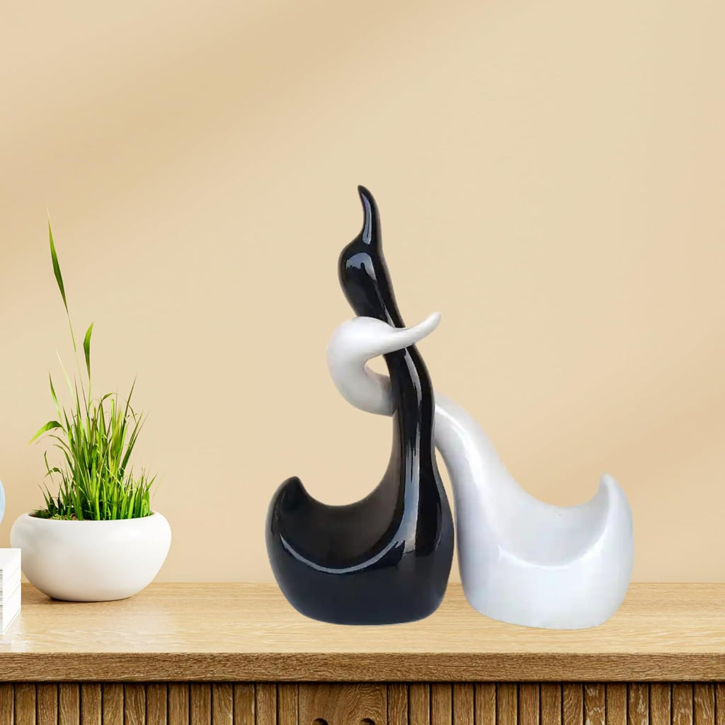 Loving Hugging and Handmade Ceramic Swans in Black and White