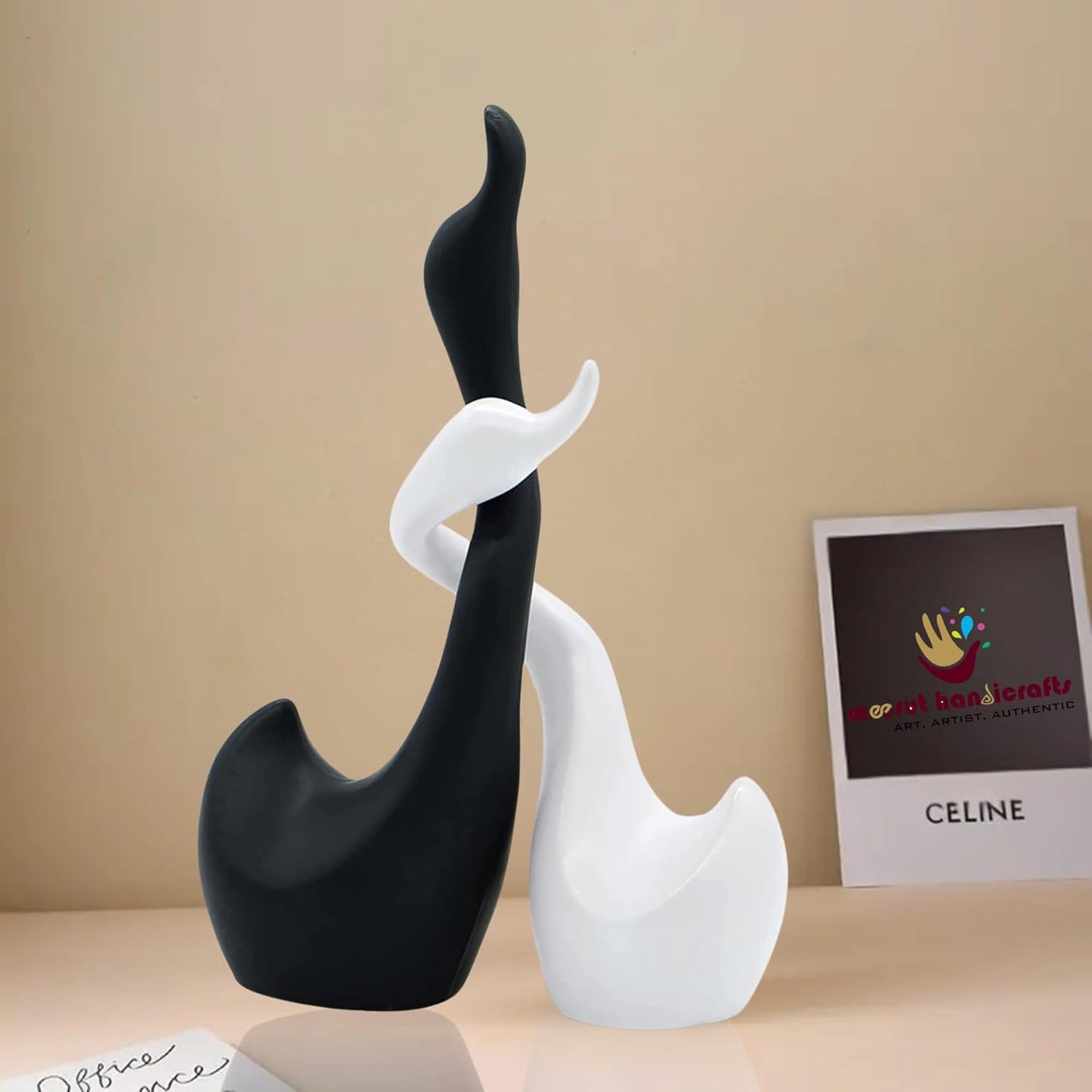 Loving Hugging and Handmade Ceramic Swans in Black and White