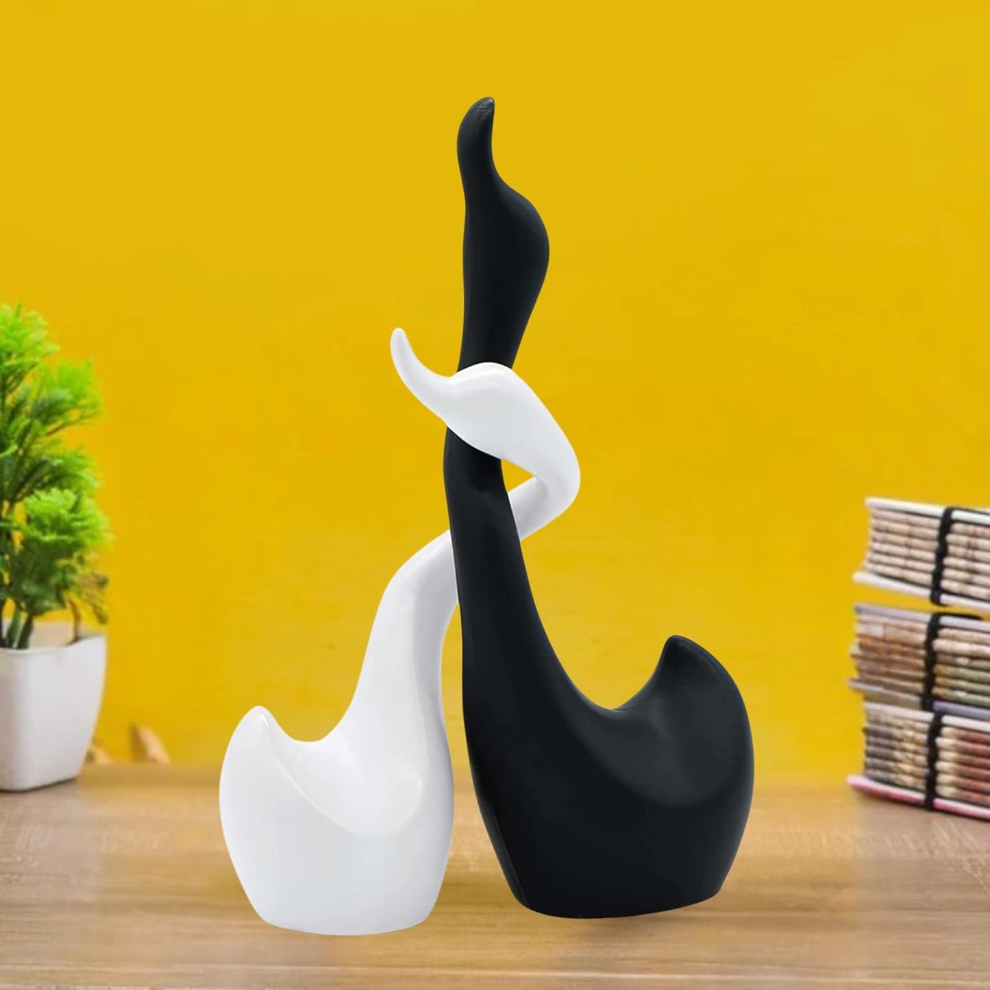 Loving Hugging and Handmade Ceramic Swans in Black and White