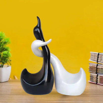 Loving Hugging and Handmade Ceramic Swans in Black and White