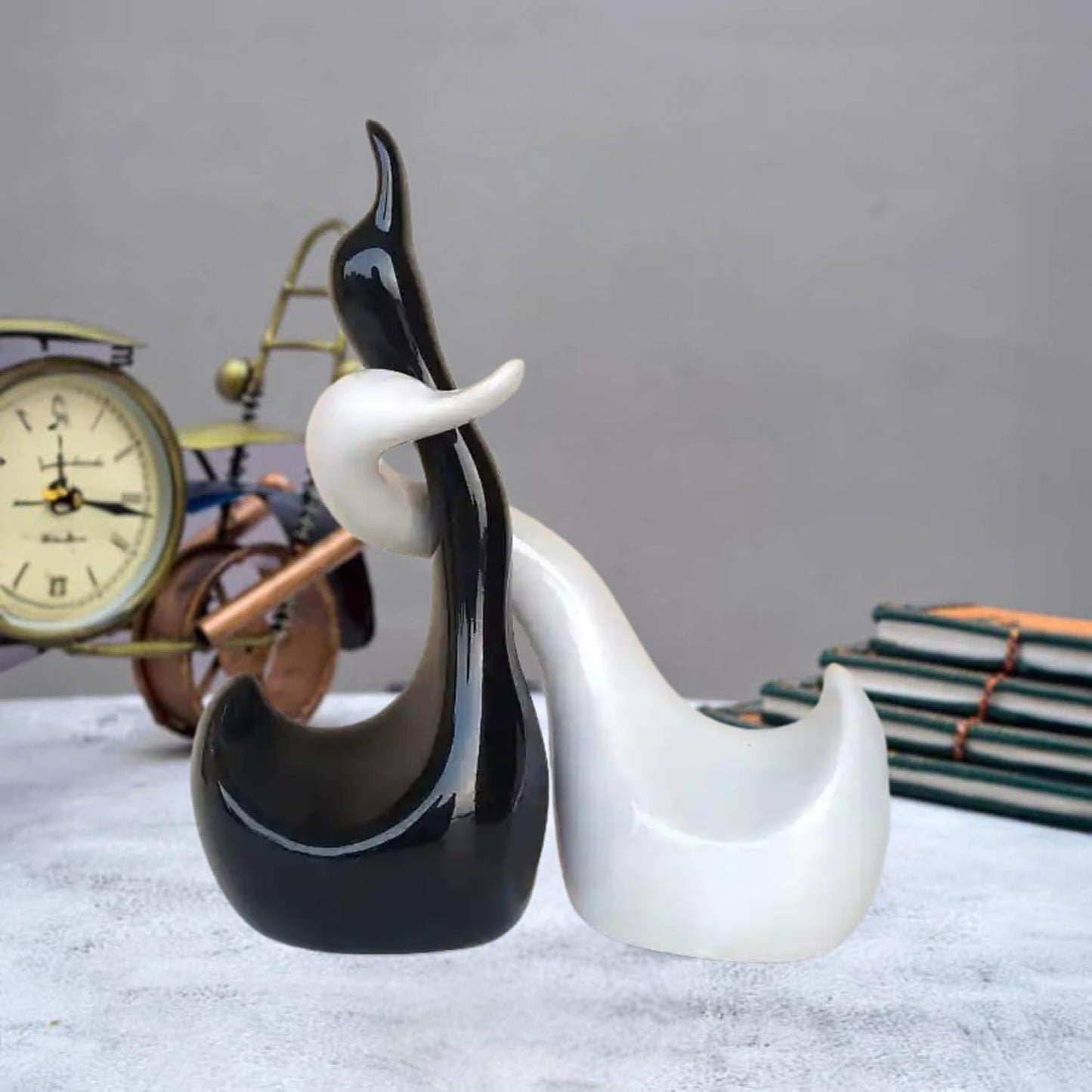 Loving Hugging and Handmade Ceramic Swans in Black and White