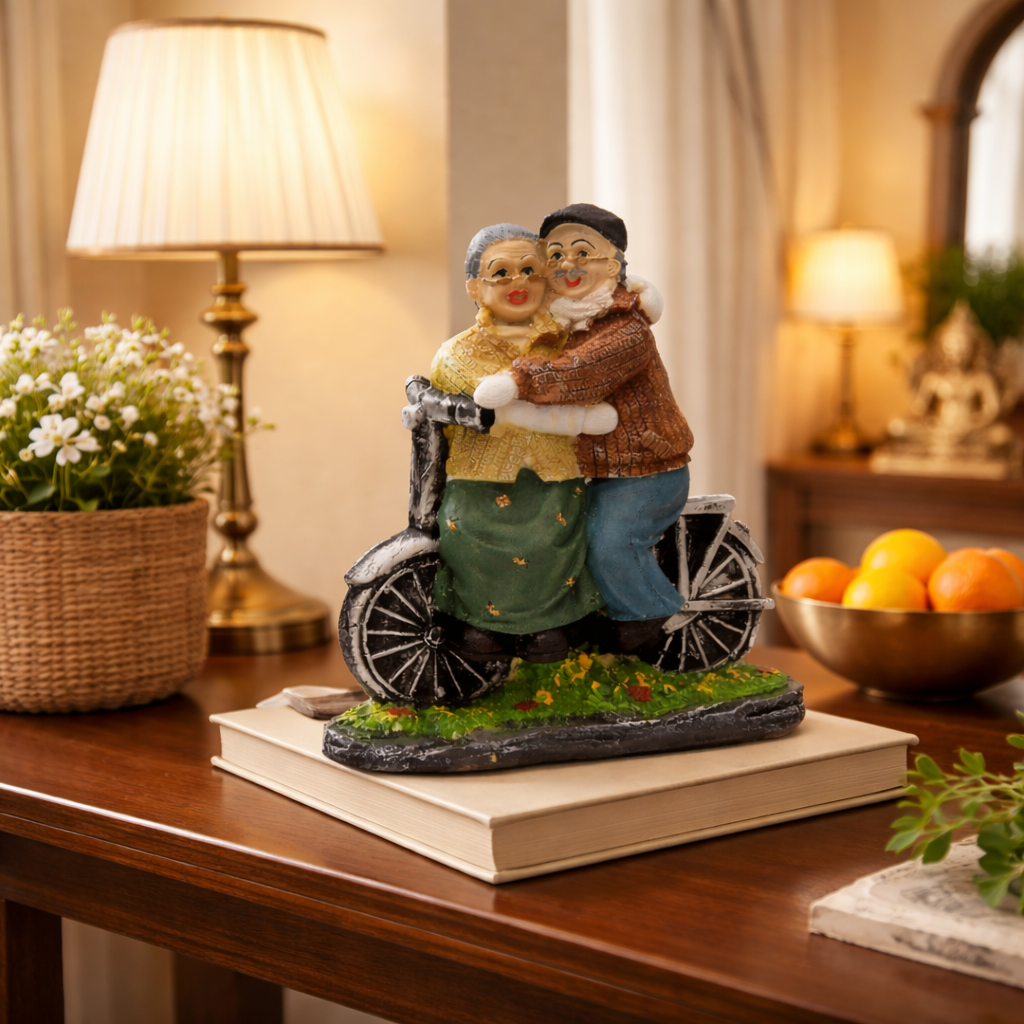 Dada-Dadi Romantic Couple Miniature Grandparents on Cycle Statue Showpiece
