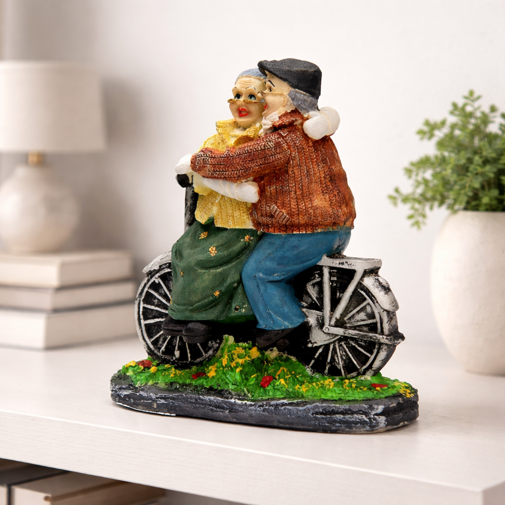 Dada-Dadi Romantic Couple Miniature Grandparents on Cycle Statue Showpiece